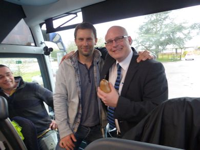 Charlie Dunn presents Bus Driver Vince with an Under 40's momento